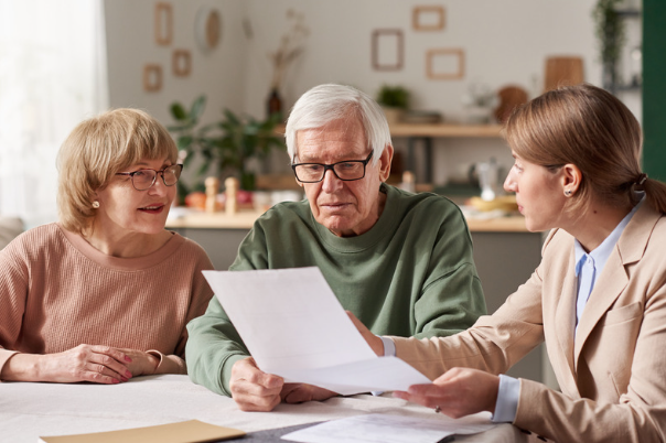 Elderly couple discussing a will